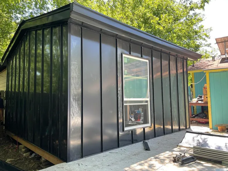 Black standing seam metal wall panels for Roof Inspection in Hoffman Estates