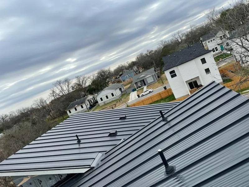 Standing seam metal roof panels with vents for Skylight Repair in Hoffman Estates